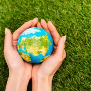 depositphotos 349492640 stock photo cropped view globe female hands